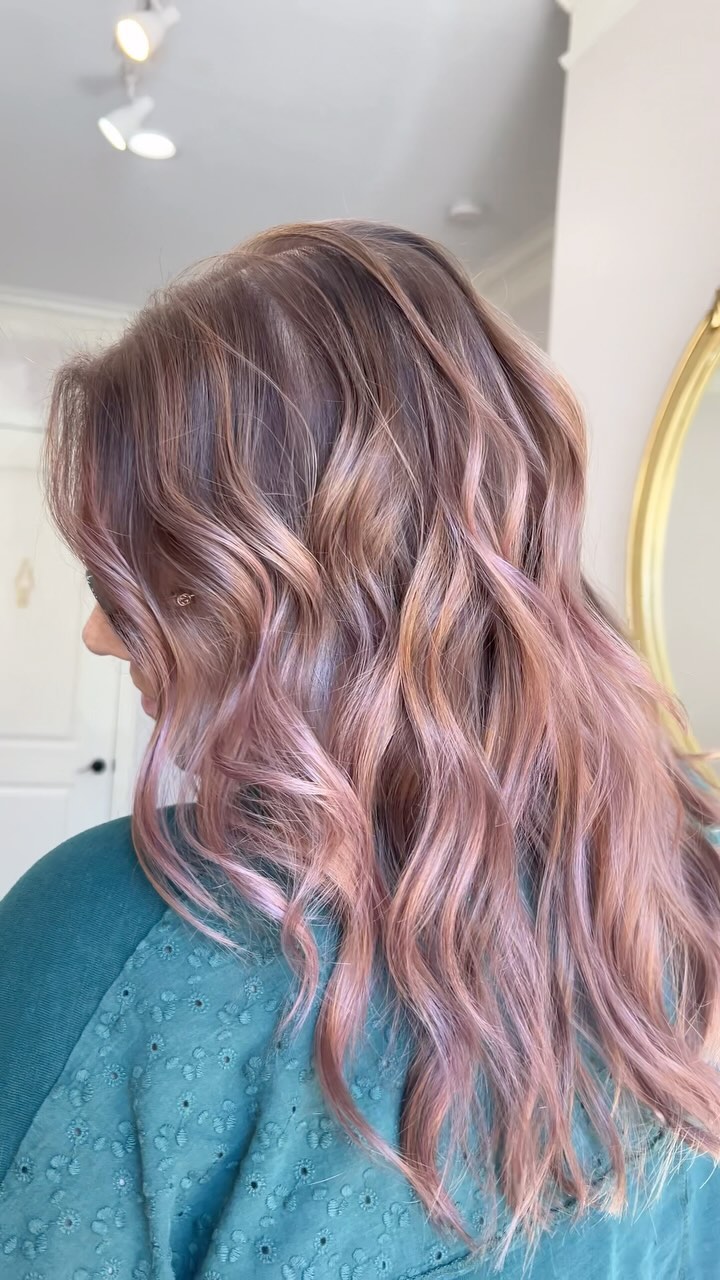 Golden blonde balayage on long hair at Vintage Park salon